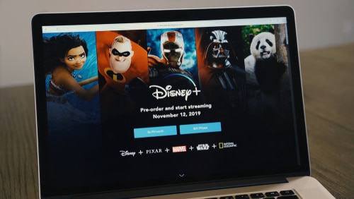 Laptop with the interface of Disney+.